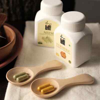 ISHALIFE Neem and Turmeric powder in veg capsules. Combo pack. 100 nos each
