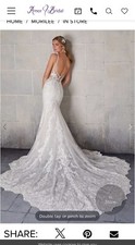 Elegant lace crystal beaded mermaid long train wedding dress size 0 with bustle