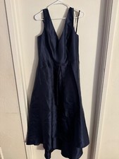 Women NWOT "Alfred Sung" navy blue sleeveless long gown. Size 16R