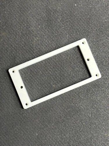 Flat, thick (6 mm), white Gibson Humbucker pickup ring.