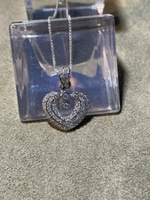 STERLING SILVER HEART SHAPED PENDANT ON 18" STERLING CHAIN -SET WITH CZ'S