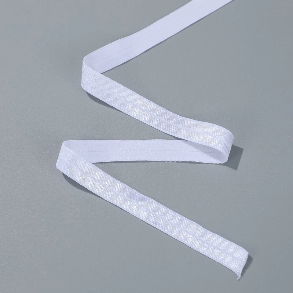 90 yardas elástico 1/2” blanco plegable FOE para diadema ropa rollo al por mayor Foto 2 de 3