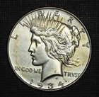 1934-P Peace Dollar US Silver Coin ... Only 954,057 - XF / AU Nice Strike