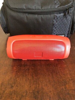 Waterproof portable bluetooth speaker (good condition, red, unbranded)
