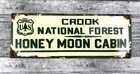 VINTAGE CROOK NATIONAL FOREST  PUMP STATION PORCELAIN GAS SIGN