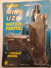 VINTAGE TRUE ACTION TOYS MINI UZI WATER PISTOL 1:1 SCALE MODEL SEALED PACKAGING