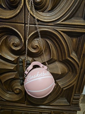 pink PU leather basketball-shaped shoulder bag featuring a chain strap and ''Bask