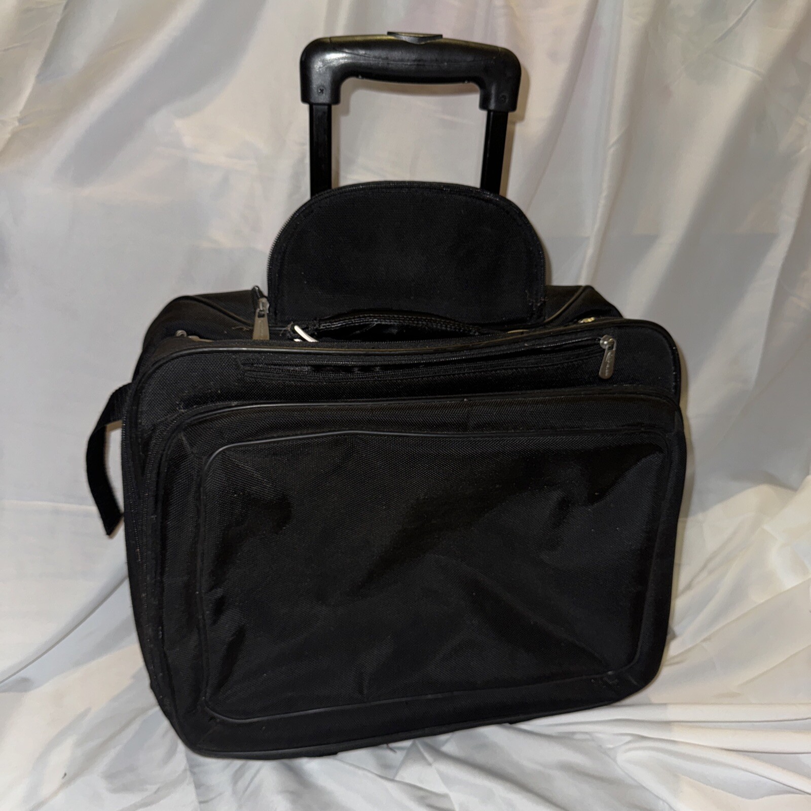 Innovera Compact Black Suitcase with Multiple Pockets and Sturdy Handle-image
