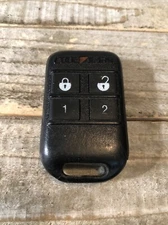 Used Code Alarm 1010686 Replacement Transmitter GOH-FRDPC2002 + Programming