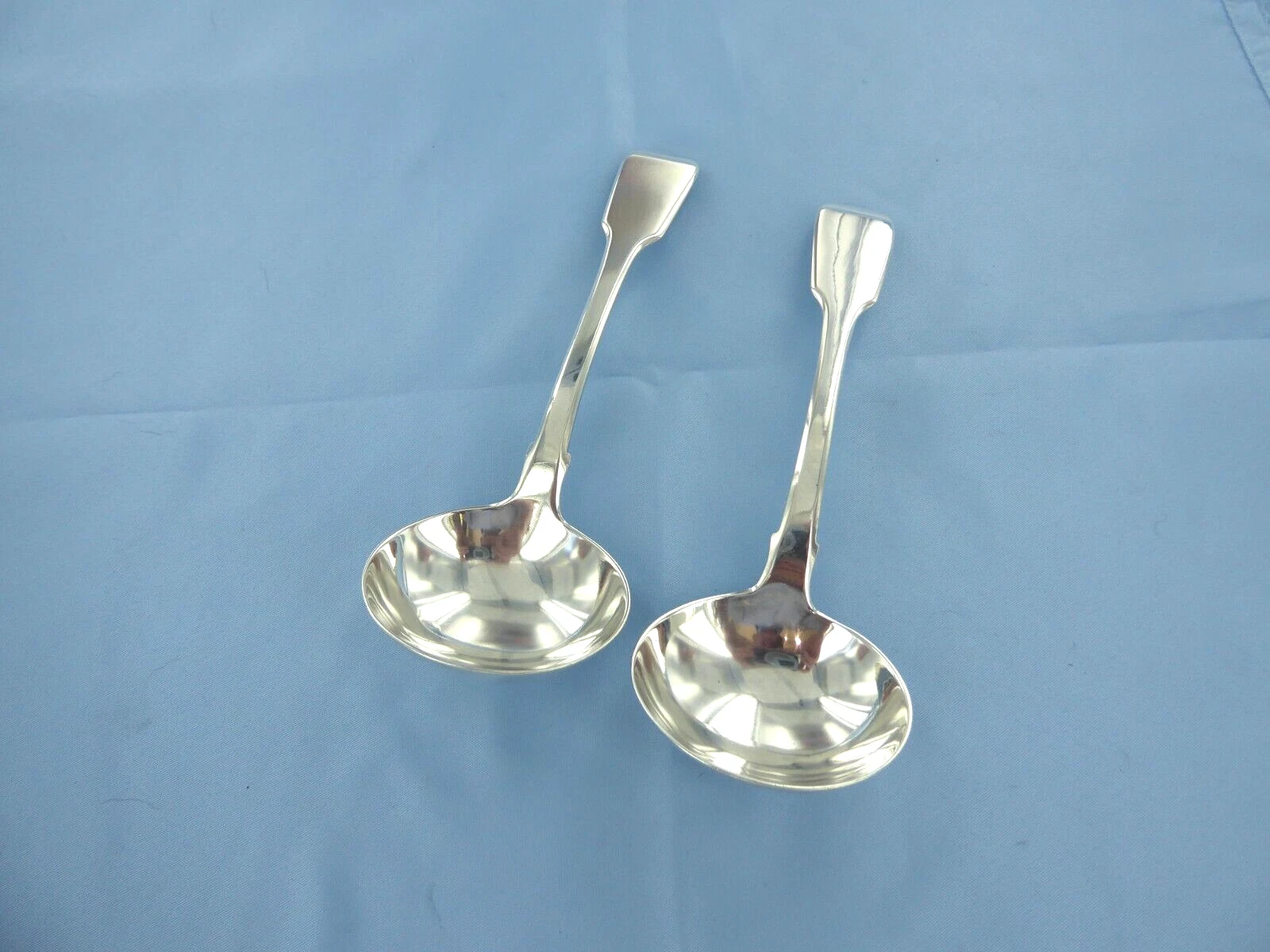 AN ANTIQUE PAIR OF STERLING SILVER OLD ENGLISH SAUCE LADLES LONDON 1832.
Opens in a new window or ta