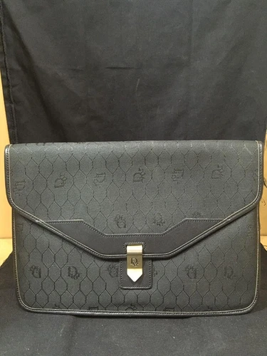 Sac à main pochette Christian Dior vintage cuir noir quincaillerie dorée élégant