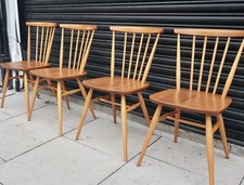 Four vintage 1970s Ercol stained 737 dining chairs