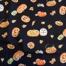 BTY Halloween Parade Pumpkins Fabric Black Cotton Clothworks