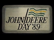 UB05129 NOS VINTAGE 1989  JOHN DEERE DAY  TRACTOR ADVERTISEMENT BELT BUCKLE