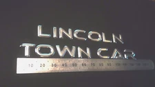 Read Listing-New 2010-2011 Lincoln Town Car Trunk Lid Emblem-Badge Set