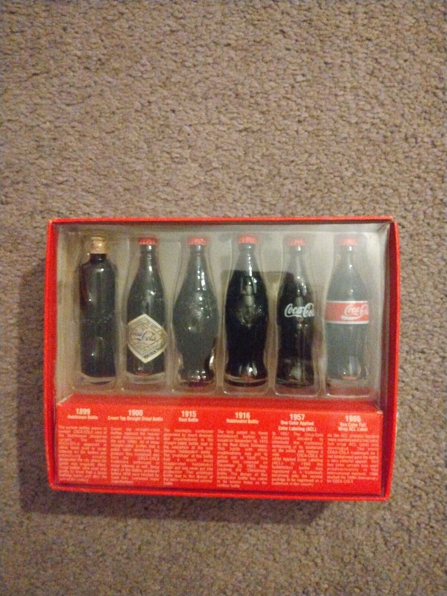 Coca-Cola 　1894年から1923年のミニチュアボトル HISTORY - In 1894, Coca-Cola was sold in bottles for the