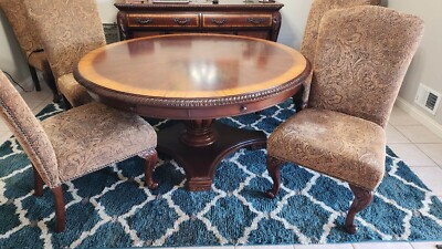 Used Haverty round dining table, leafs, upholstered chairs and buffet/sideboar