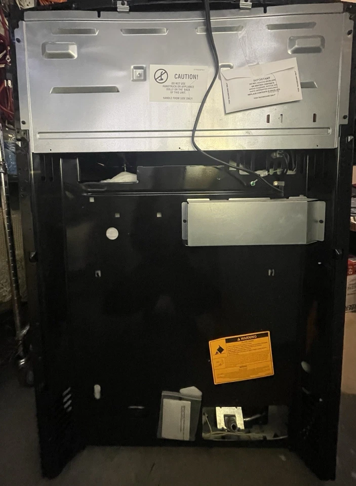 Nueva gama de estufas GE negra/plateada Foto 4 de 4