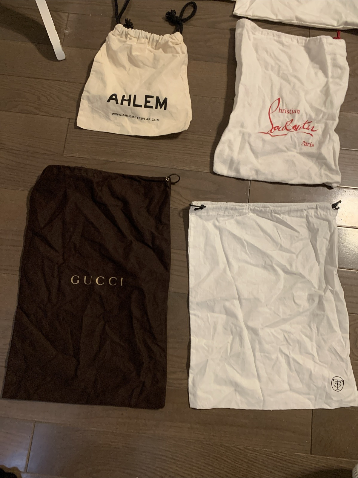 Lotto 10 sacchetti antipolvere Saint Laurent Gucci Louboutin Coach Badgley Mischka