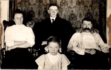 Family Portrait RPPC Postcard 1910s Handlebar Mustache & Puffed Sleeves