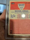 1986-87 Fleer - Michael Jordan #57 (RC) graded 6 by FCG