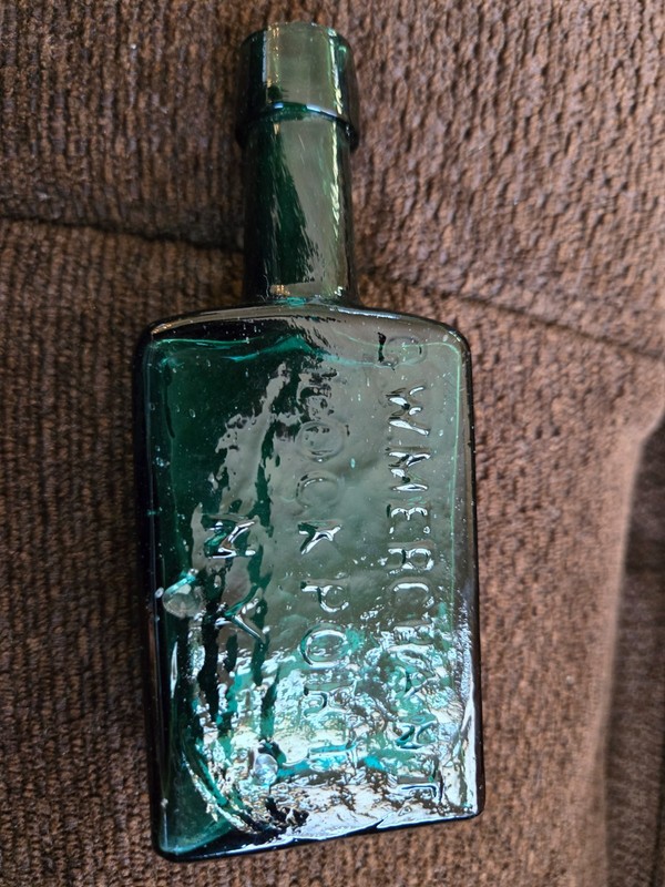 Pontiled Green G.W. Merchant Lockport N.Y. Bottle