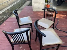 Metal restaurant chairs with new covers.