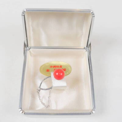 coral tie pin