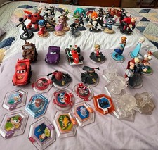 Disney Infinity Lot Of 42 Figures and 10 Power Disks, good condition with case
