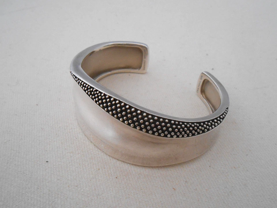 Brazalete esculturado de plata de ley 125,016 inspirador Michael Dawkins Foto 2 de 4