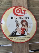 VINTAGE COLT REVOLVES PORCELAIN ADVERTISING SIGN 1962 HARTFORD, CT 12"