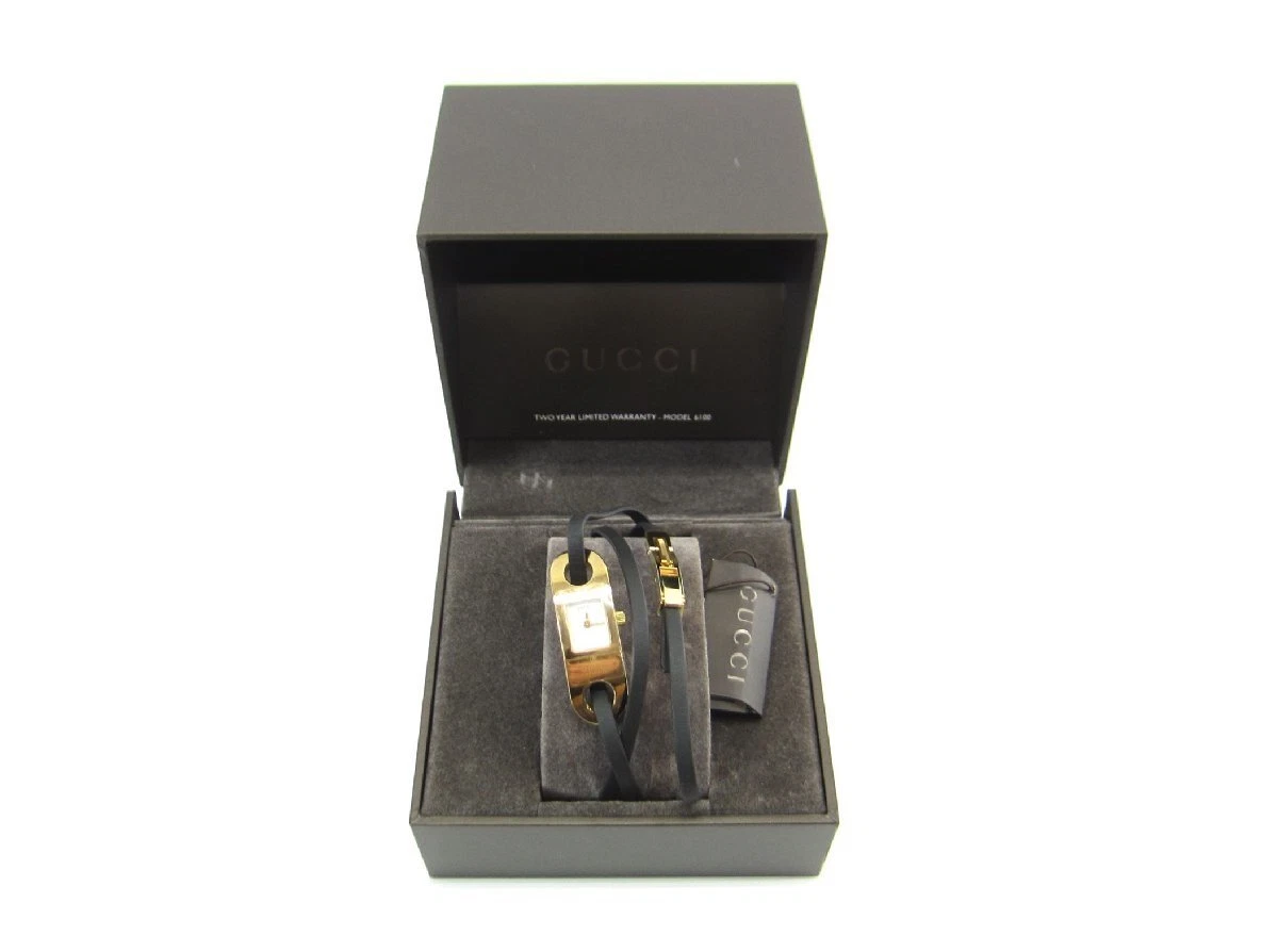 Bracelet GUCCI montre d'occasion pour femme quartz 6100 L or SS étanche
