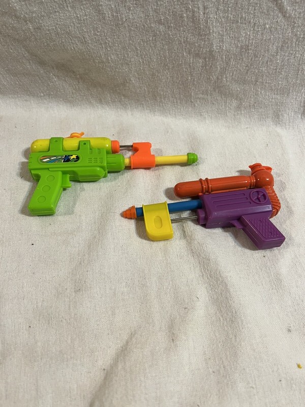 Vintage keychain squirt gun super soaker
