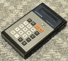 Vintage Lloyd's Accumatic 304 calculator, Japan 1970s, Acqua Fluorescent Display