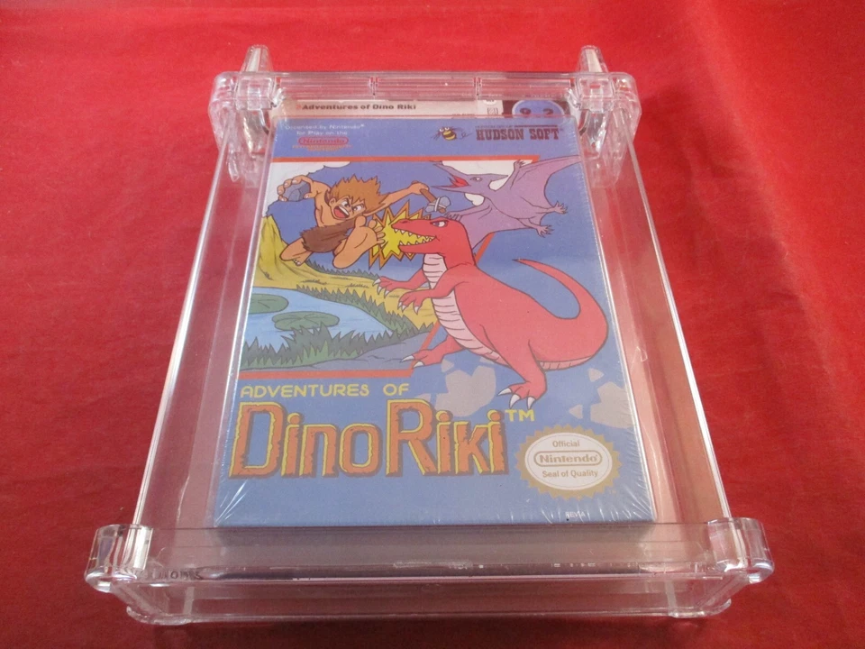 Adventures of Dino Riki (Nintendo NES) **NUEVO** ¡Sellado! WATA 9.2 A *estuche dañado* Foto 3 de 4