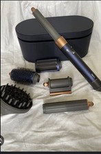 Dyson air wrap brand new condition tested once.