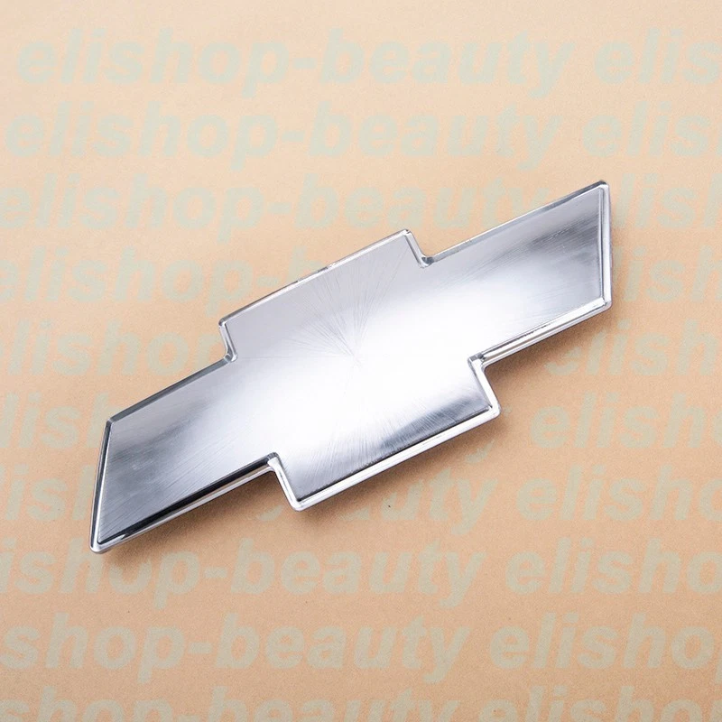 NUEVO 1999-02 Silverado 2000-06 Tahoe Suburban Parrilla Frontal Emblema Pajarita Plateado Foto 4 de 4