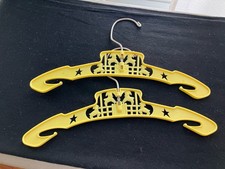 Two Vintage 1970’s Yellow Plastic Baby Child Swivel Cloths Hangers Lambs 9 1/2”