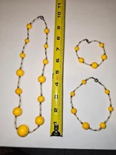 3 separate vintage pieces can be connected together at magnetic clasps yellow