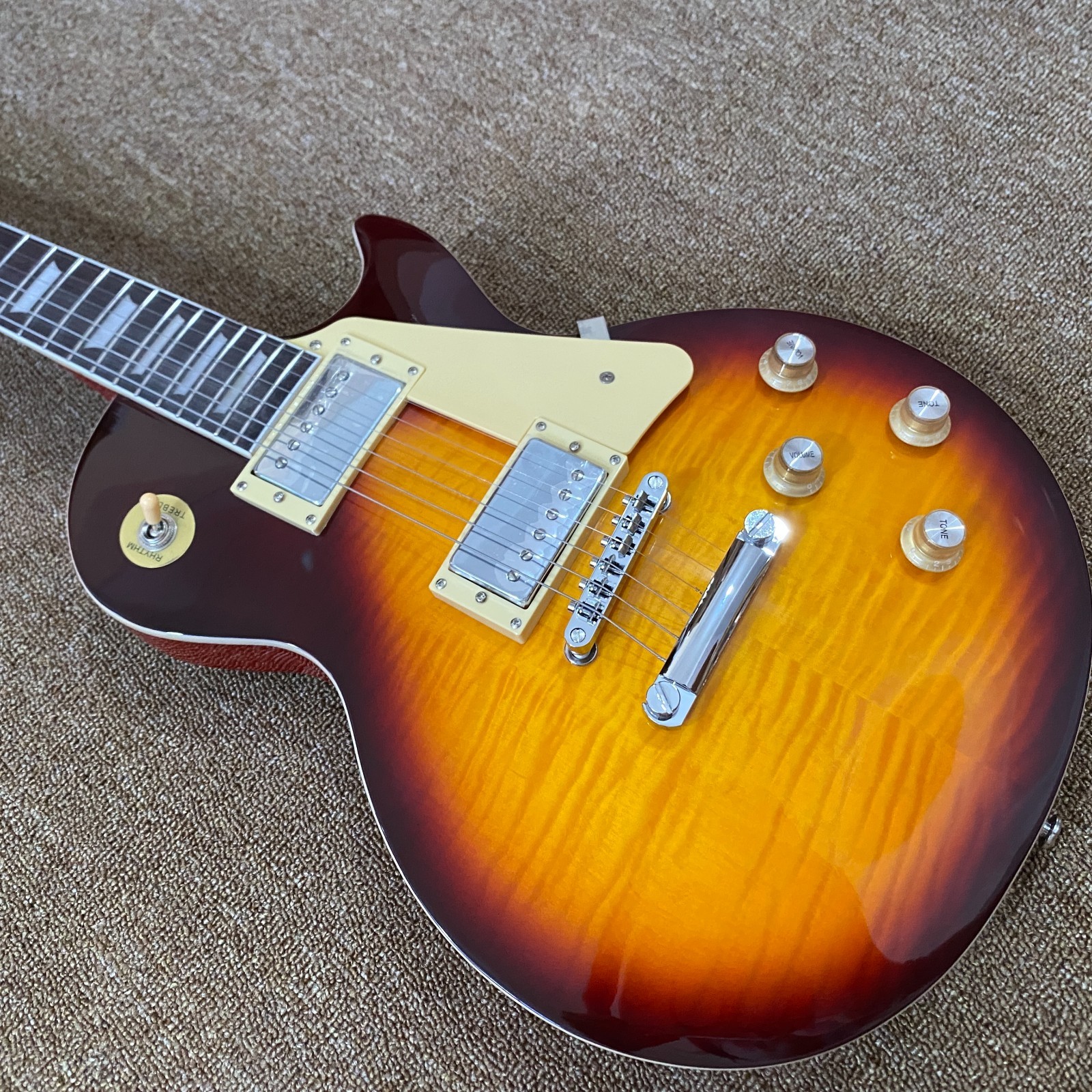 Sunburst color, LP Electric Guitar Flame maple veneer, 2H pickups, 22 Frets