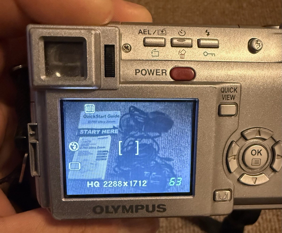 Olympus C-765 Ultra Zoom Camera, Battery, Charger, Manual, 16MB XD
