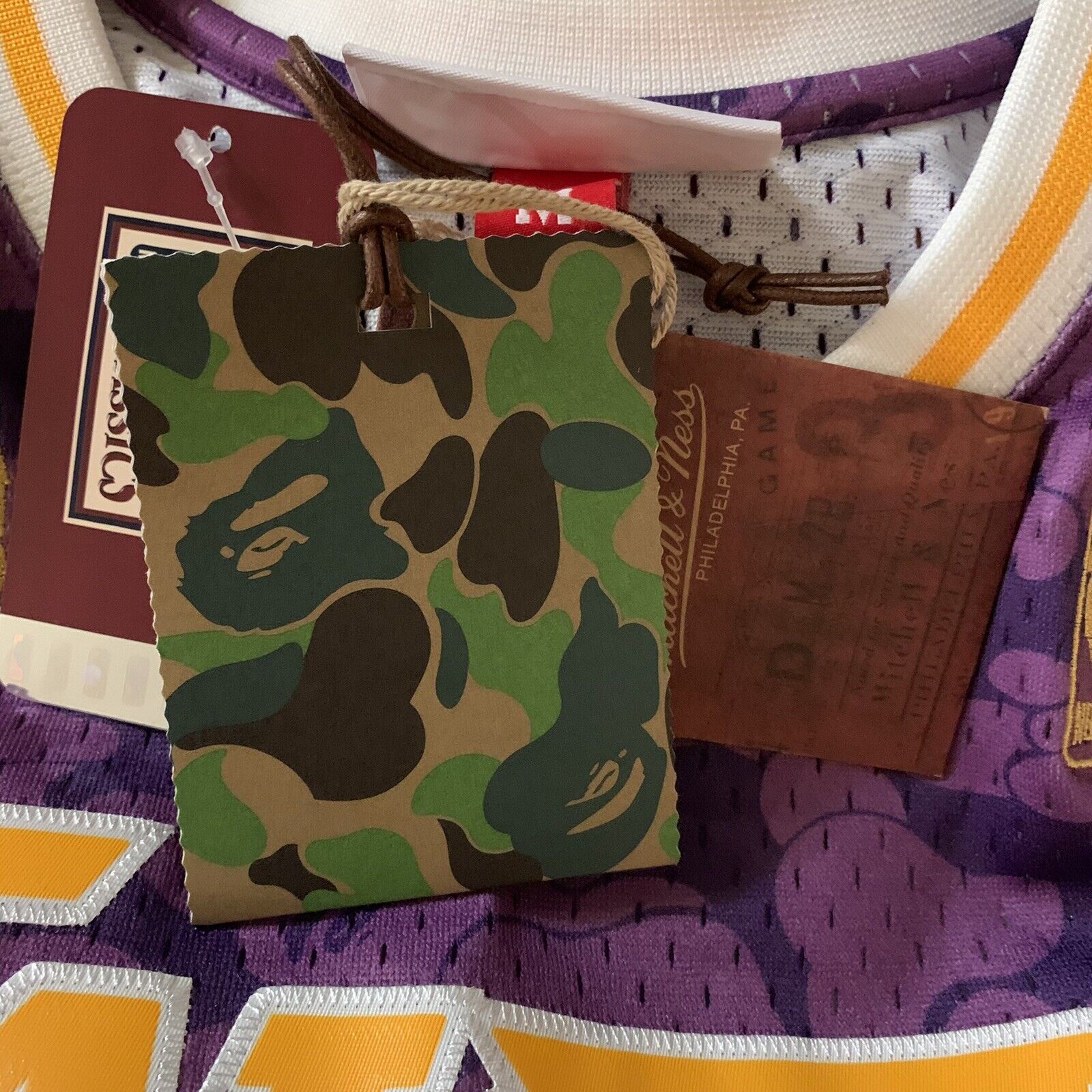 Bape x Mitchell & Ness Raptors Camo Basketball Swingman Jersey Purple