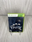 Thief (Microsoft Xbox 360, 2014) Tested Working Cracked Case
