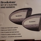 Brookstone Electric Hand Warmers NEW Set of 2 Battery Operated Quick Heating — photo 2