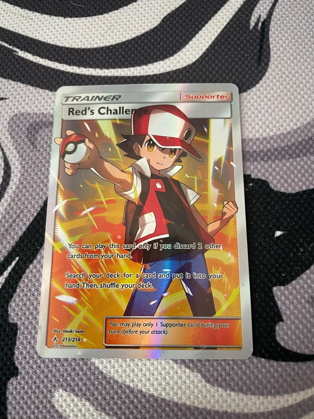 Red's Challenge (Full Art) 213/214 Sm-Unbroken Bonds Holo