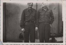 WW2 Photo of 2 Soldiers Standing Posed Beside Barracks Wall