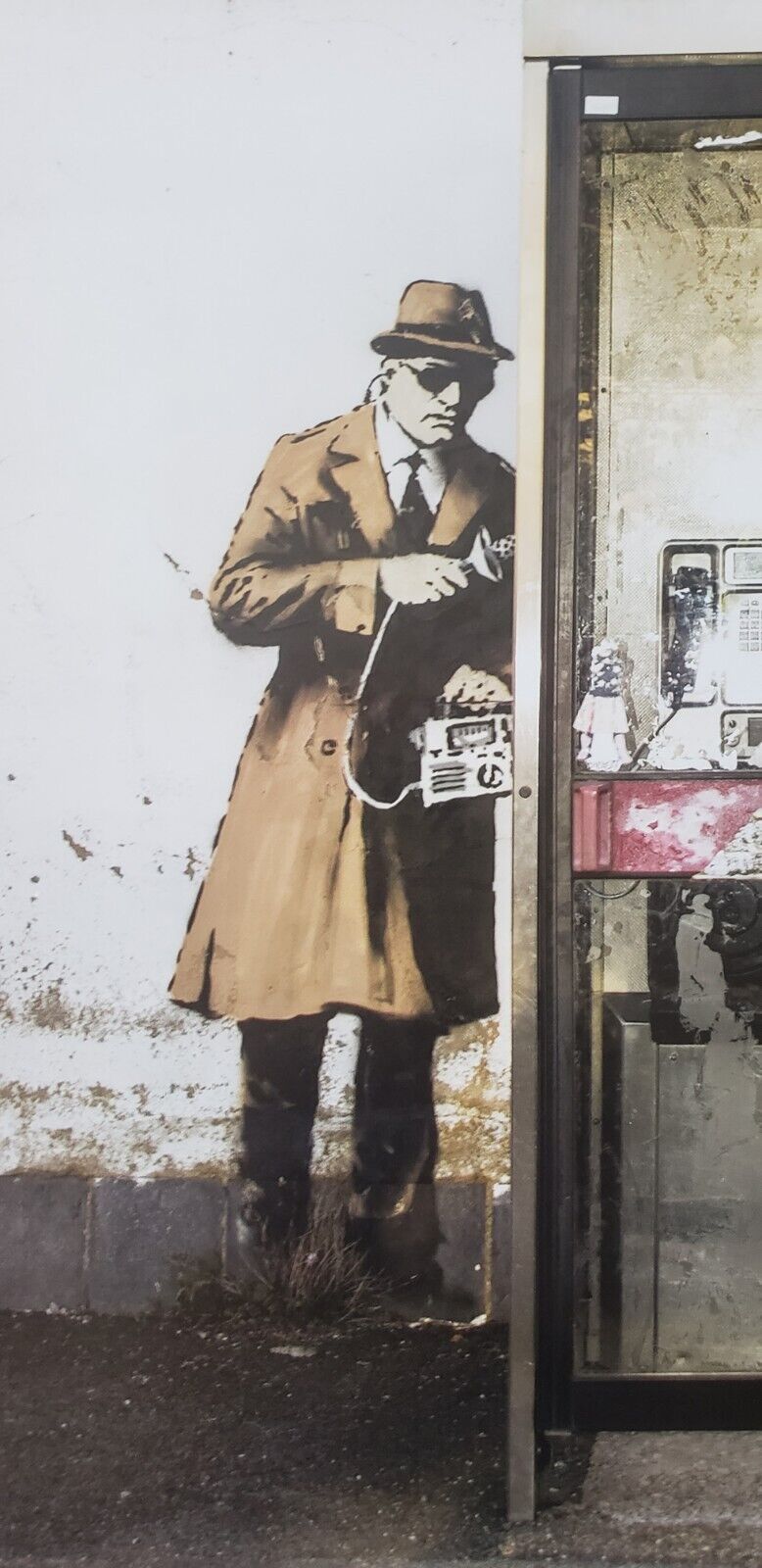 Seven-Figure Banksy <em>Spy Booth</em> Vandalized