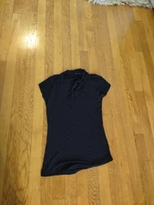 short sleeved classy blouse with bow at the neck fits like small 