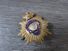 British Legion Early Cap Badge with Two Lugs and the Number N 2289 on the Back