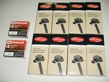 JUEGO DE LAS 8 BOBINAS DE ENCENDIDO DELPHI Y 8 TAPONES PLATINO MOTORCRAFT SP479 NUEVO